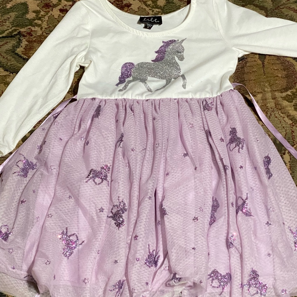 Super cute lavender/lilac glittery tulle dress. Soft material and comfy
